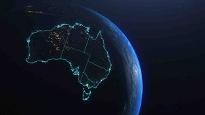 graphic of the globe from space with the outline of Australia lit in blue light